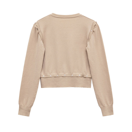 Pull en tricot pour femmes avec décolleté en V et boutons décoratifs Chic und Stil
