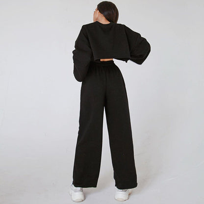 Dames élégant ensemble de salon avec haut ample et pantalon taille haute Chic und Stil