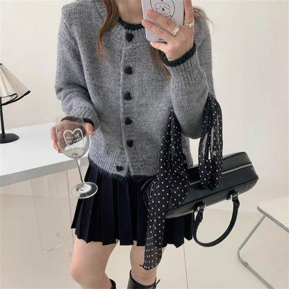 Dames gilet en tricot douillet avec boutons en forme de cœur et conception de manches raffinée Chic und Stil