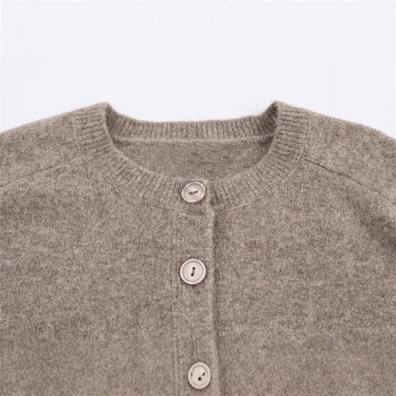 Ladies comfortable knit pullover with button closure and raglan sleeves Chic and Style