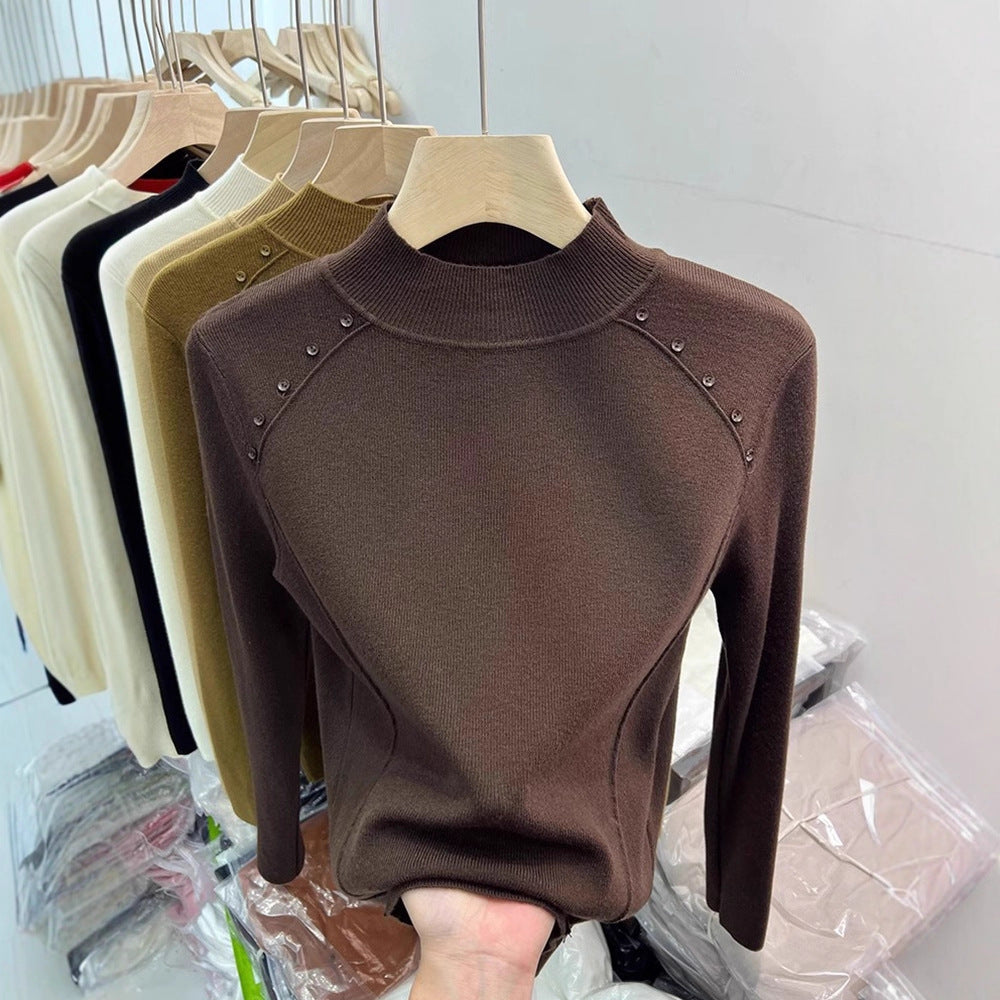 Pull élégant pour femmes avec détails de boutons et col haut Chic und Stil