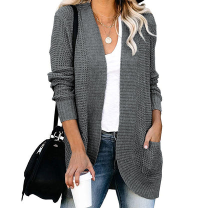 Veste en tricot pour femmes avec un motif de tricot moderne et des poches pratiques Chic und Stil