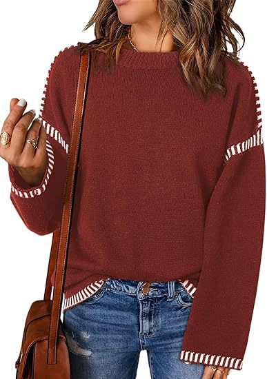 Pull féminin à la mode avec un matériau structuré et des détails en forme de rayures Chic und Stil