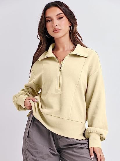 Pull sportif pour femmes avec col montant et demi-zip Chic und Stil