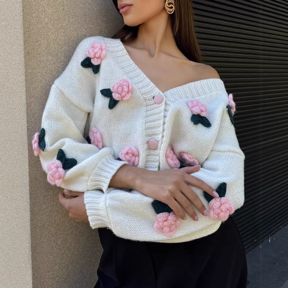 Dame cardigan avec design floral brodé et bord côtelé Chic und Stil