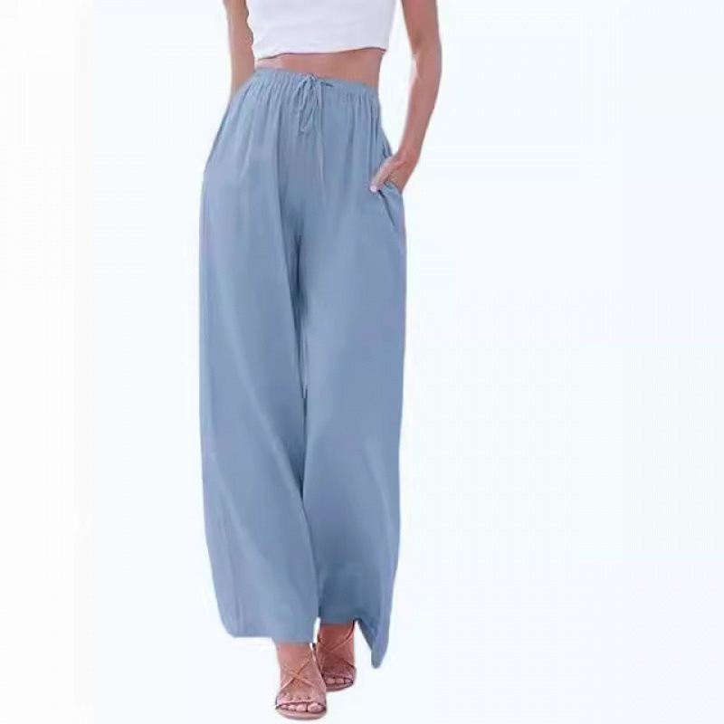 Wide palazzo pants for women with elastic waistband and side pockets Chic und Stil