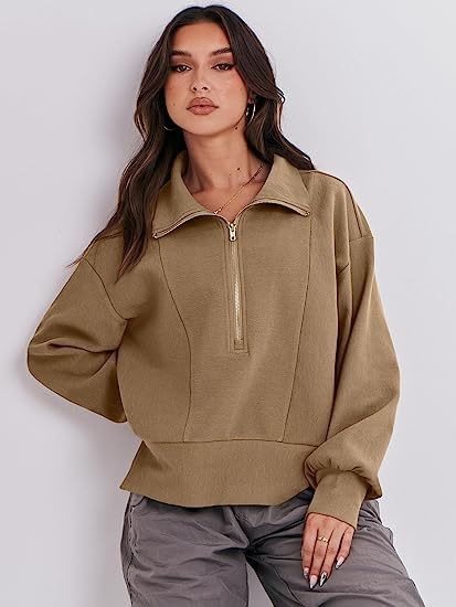 Pull sportif pour femmes avec col montant et demi-zip Chic und Stil