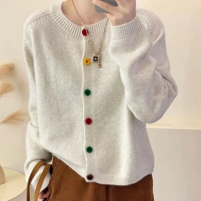 Women's playful knit vest with colorful button details Chic and Stil