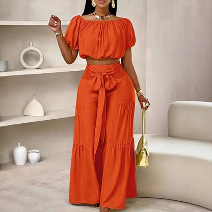 Woman Deep V-Neck Crop Top and High-Waisted Palazzo Pants Chic and Style