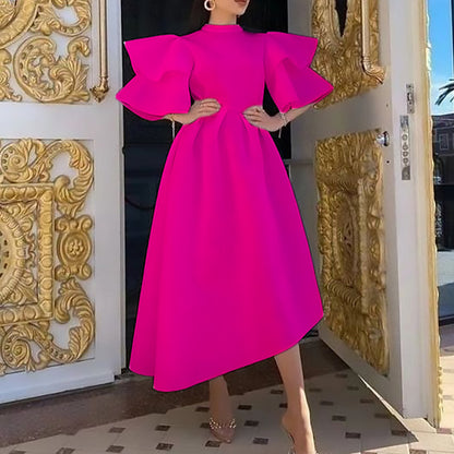 Robe midi femme avec des manches bouffantes volumineuses et un ourlet asymétrique Chic und Stil