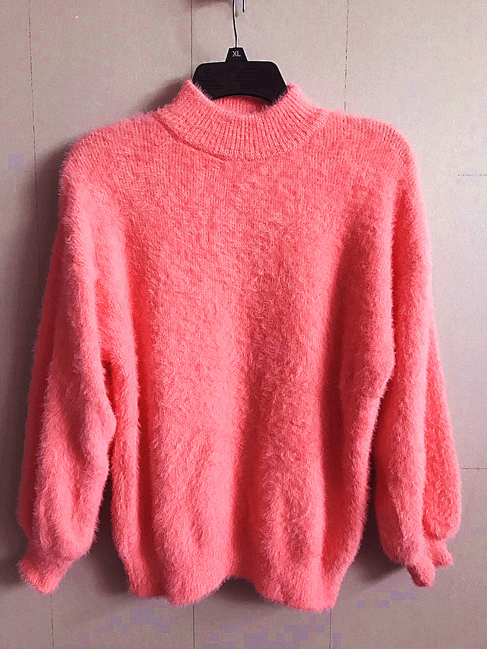 Pull en mohair pour femmes avec col roulé, manches bouffantes et design texturé Chic und Stil