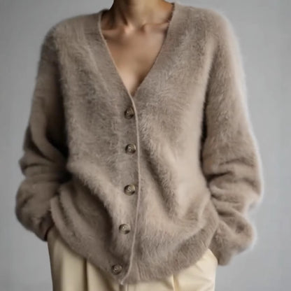 Cardigan en peluche pour dames avec boutons élégants et coupe ample Chic und Stil
