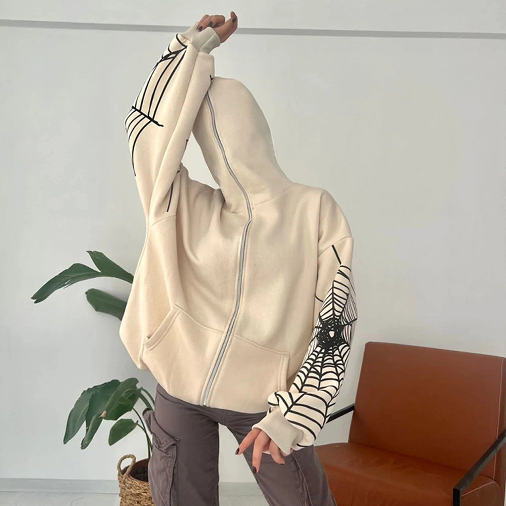 Pull à capuche pour femmes avec un motif unique de toile d'araignée et une coupe généreuse Chic und Stil