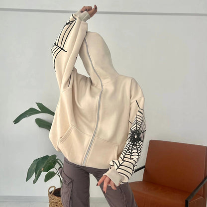 Pull à capuche pour femmes avec un motif unique de toile d'araignée et une coupe généreuse Chic und Stil