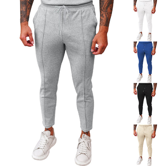 Pantalon de jogging sportif pour hommes avec taille élastique et poches zippées Chic und Stil
