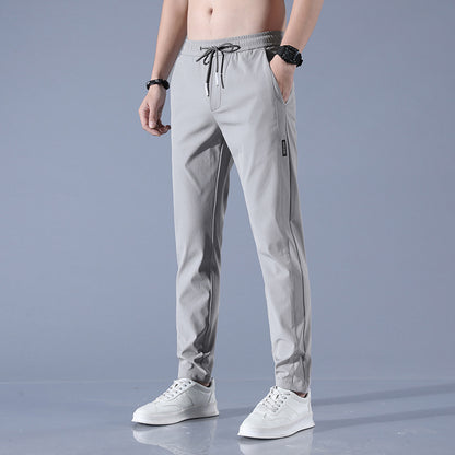 Men's sports pants with adjustable drawstring and zippered pockets on the sides Chic and Style