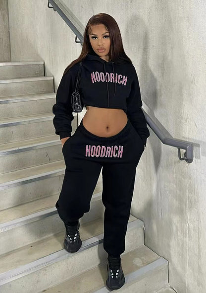 Men's sporty hoodie and jogger pants set with trendy inscription Chic und Stil