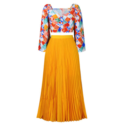 Robe combinée plissée pour dames avec un haut coloré et une jupe évasée Chic und Stil