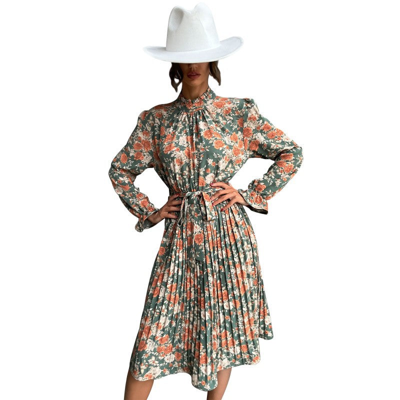 Robe midi pour dames avec motifs floraux et ceinture ajustable Chic und Stil