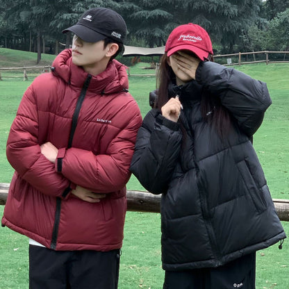 Dame Veste matelassée thermoisolante avec capuche ajustable et poches latérales Chic und Stil