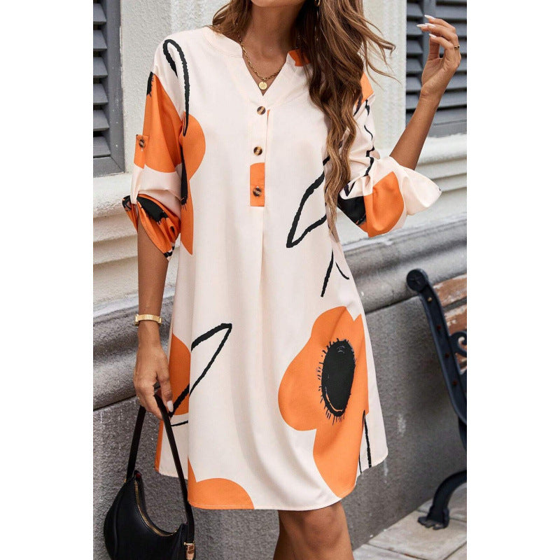 Robe de loisirs pour femmes avec un design graphique coloré et des détails de boutons modernes Chic und Stil