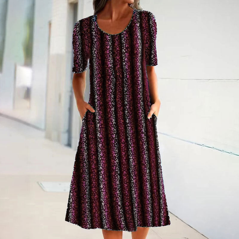 Robe midi pour femmes avec un motif à rayures florales et des poches latérales pratiques Chic und Stil