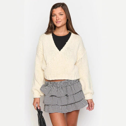 Pull en tricot confortable pour femmes avec un design moderne à enroulement Chic und Stil