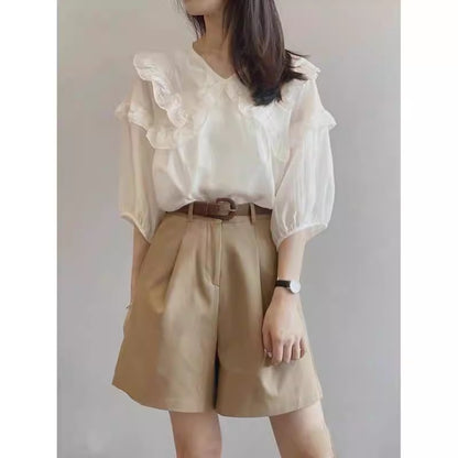 Elegant ruffled blouse set and fitted shorts Chic and Style