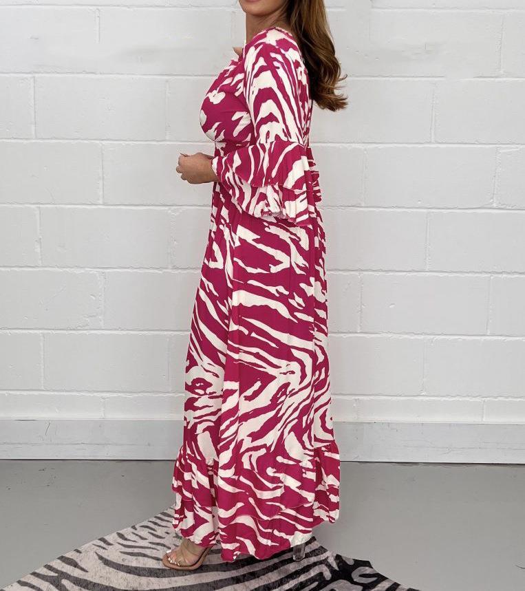 Robe maxi femme avec décolleté en V et jupe évasée Chic und Stil