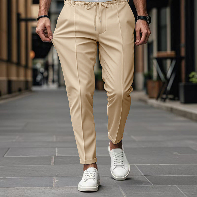 Men's fashionable sports pants with elastic waistband and practical welt pockets Chic and Style