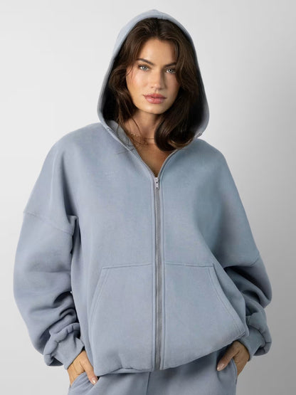 Femmes pull à capuche oversized à la mode avec pantalon de jogging assorti Chic und Stil
