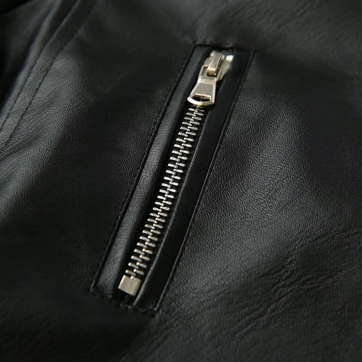 Biker jacket in faux leather for women with embroidered floral design and stud embellishments Chic and Style