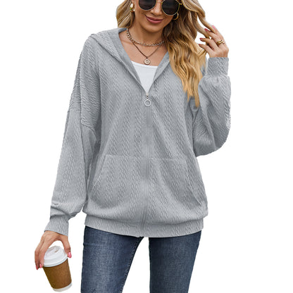 Dames Pull à capuche surdimensionné avec motif texturé et poches pratiques Chic und Stil