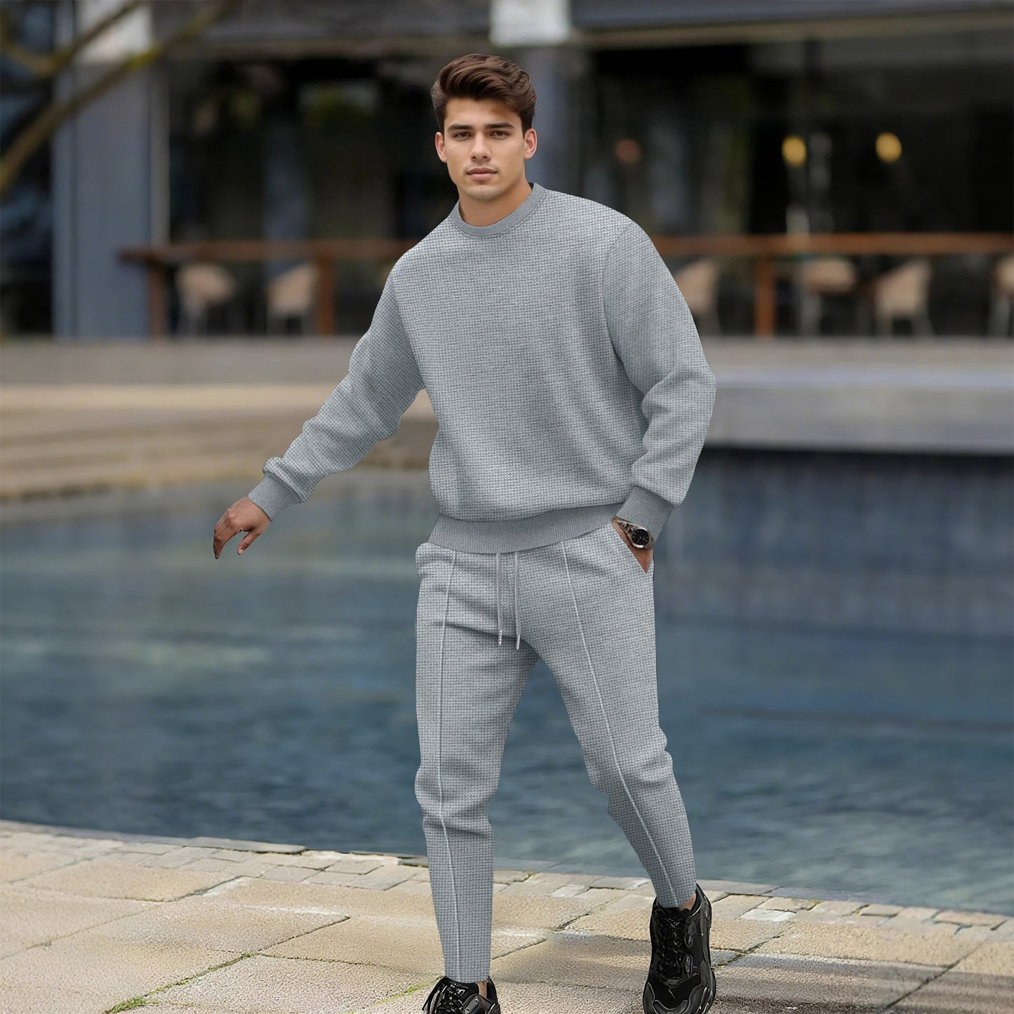 Trendy men's jogger set with textured top and slim-fit pants Chic and Style
