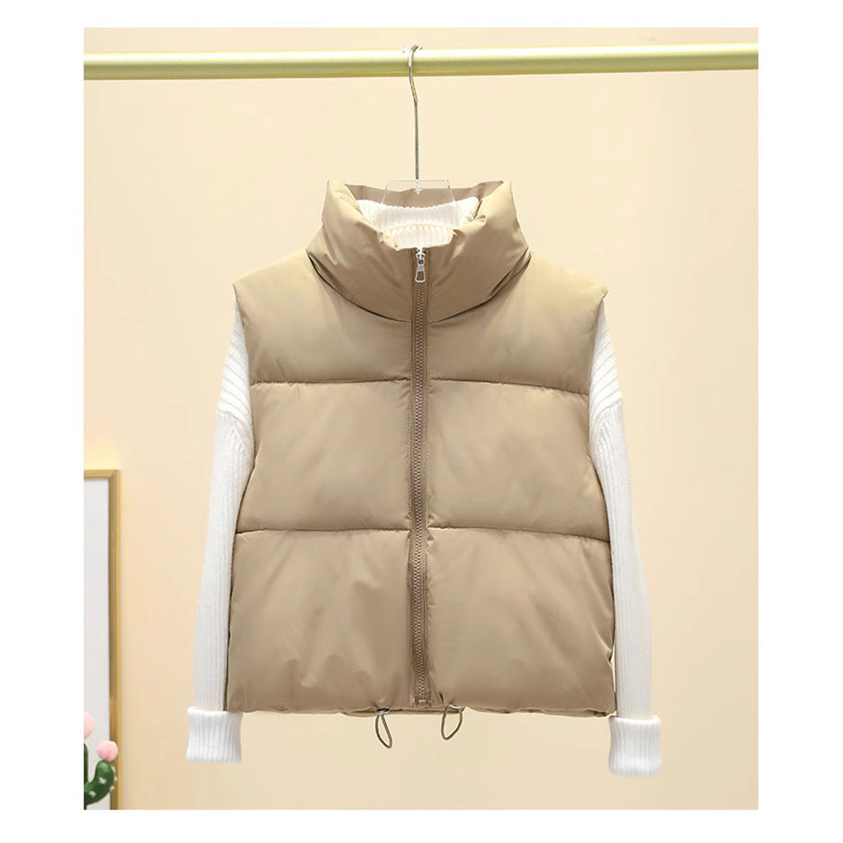 Dames gilet matelassé avec col haut et taille ajustable Chic und Stil