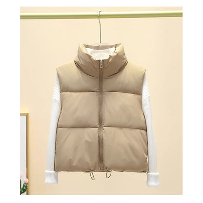 Dames gilet matelassé avec col haut et taille ajustable Chic und Stil