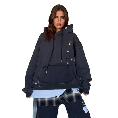 Dame Sweat à capuche surdimensionné avec des éléments de design spéciaux Chic und Stil