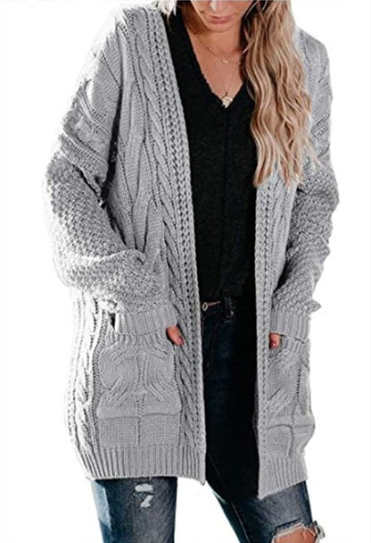 Dames grosse tricot cardigan avec une structure en torsades frappante et des poches pratiques Chic und Stil