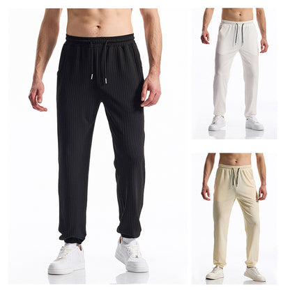 Comfortable sports pants for men with elastic waistband and chic striped design