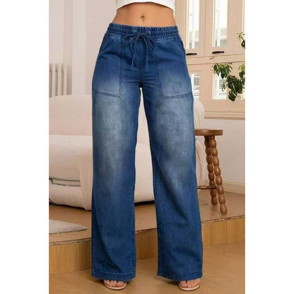 Wide denim pants for women with an elastic waistband and side pockets Chic und Stil
