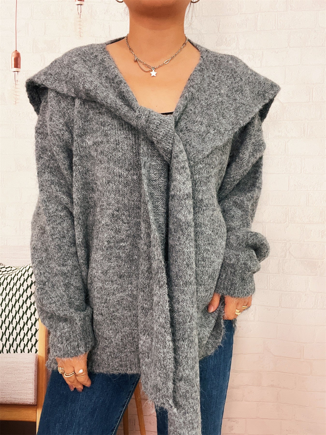 Pull de laine décontracté pour femmes avec capuche amovible et détails de boutons Chic und Stil