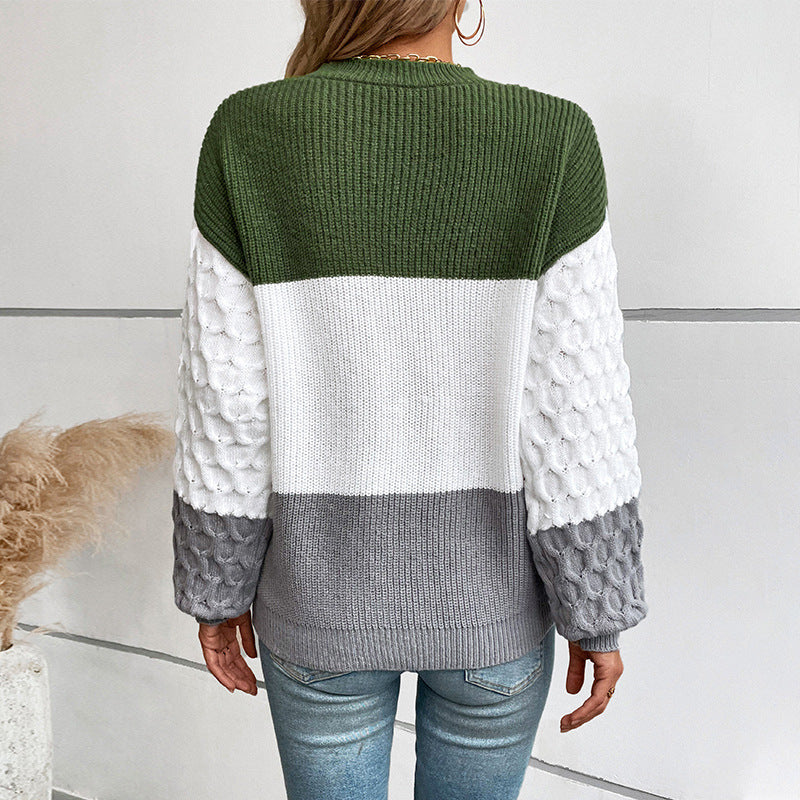 Pull féminin à la mode avec manches structurées et rayures bloc Chic und Stil