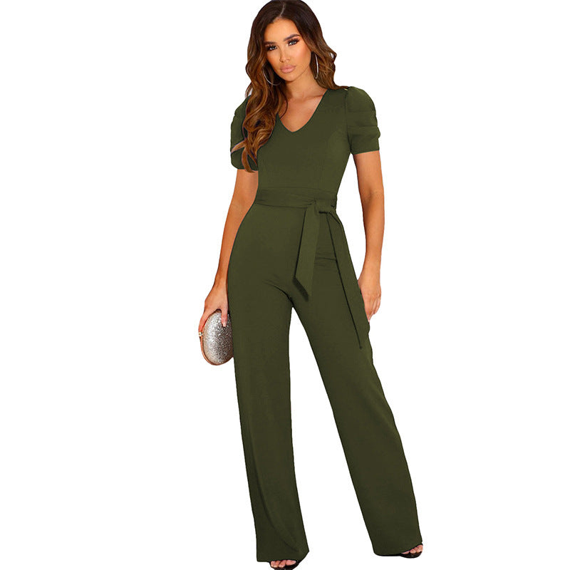 Elegant women's jumpsuit with waist belt and puff sleeves Chic and Style