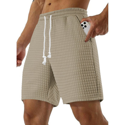 Shorts de sport pour hommes en material respirant avec poches latérales pratiques Chic und Stil