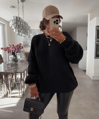 Pull en tricot pour femmes avec des manches volumineuses et une texture fine Chic und Stil