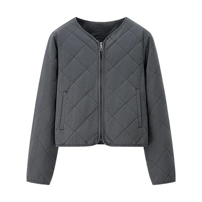 Quilted transition jacket for women with practical pockets and stylish stand-up collar Chic and Style