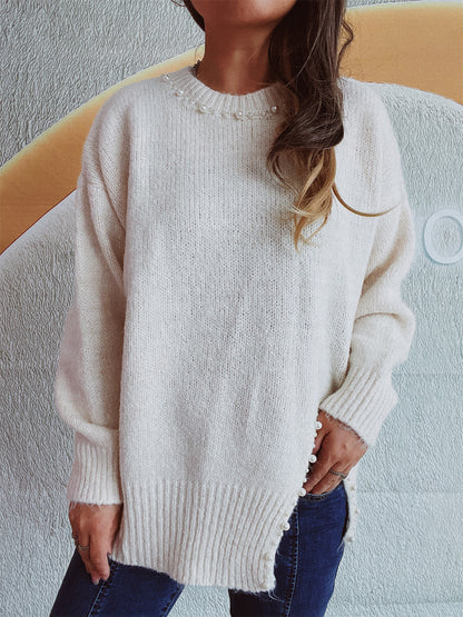 Pull en grosse maille pour femmes avec décolleté à perles et ourlet asymétrique Chic und Stil