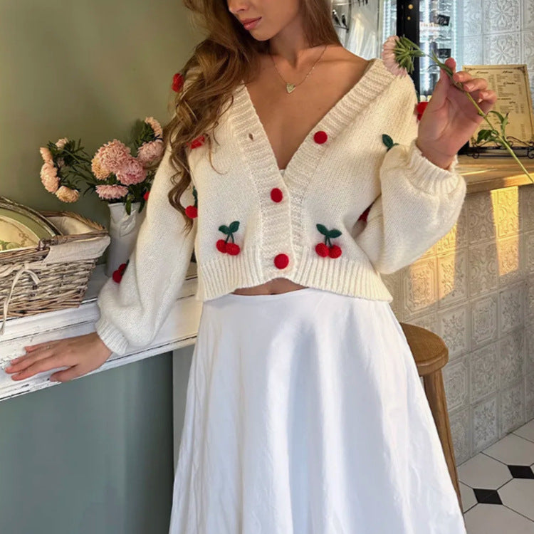 Dame cardigan avec design floral brodé et bord côtelé Chic und Stil