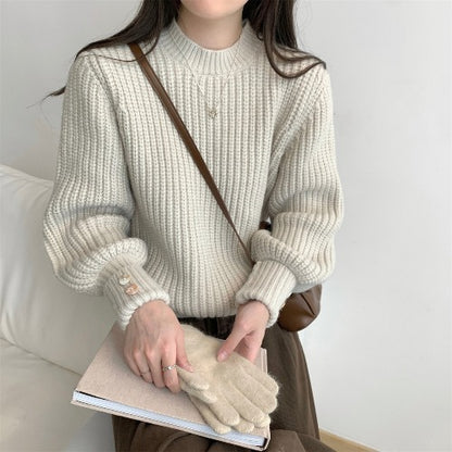 Pull en gros tricot pour femmes avec encolure ras du cou et boutons décoratifs Chic und Stil
