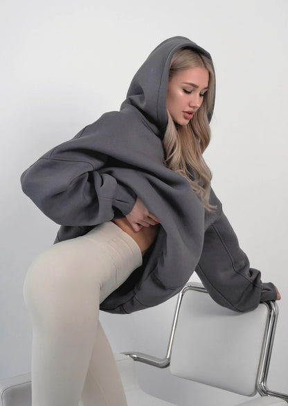 Pull à capuche oversized pour femmes avec une coupe ample et des poches pratiques Chic und Stil